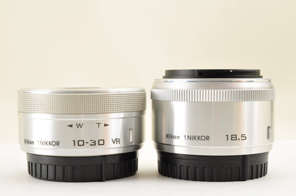 [US Duty Paid] Nikon 1 J5 Silver Double Lens Kit 10-30mm & 18.5mm SC: 1652 USA